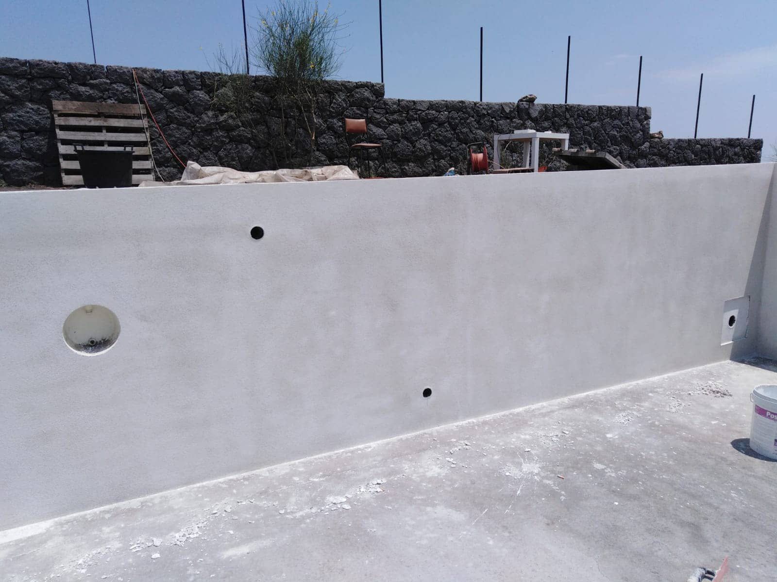 Poseidone microcement on a pool wall