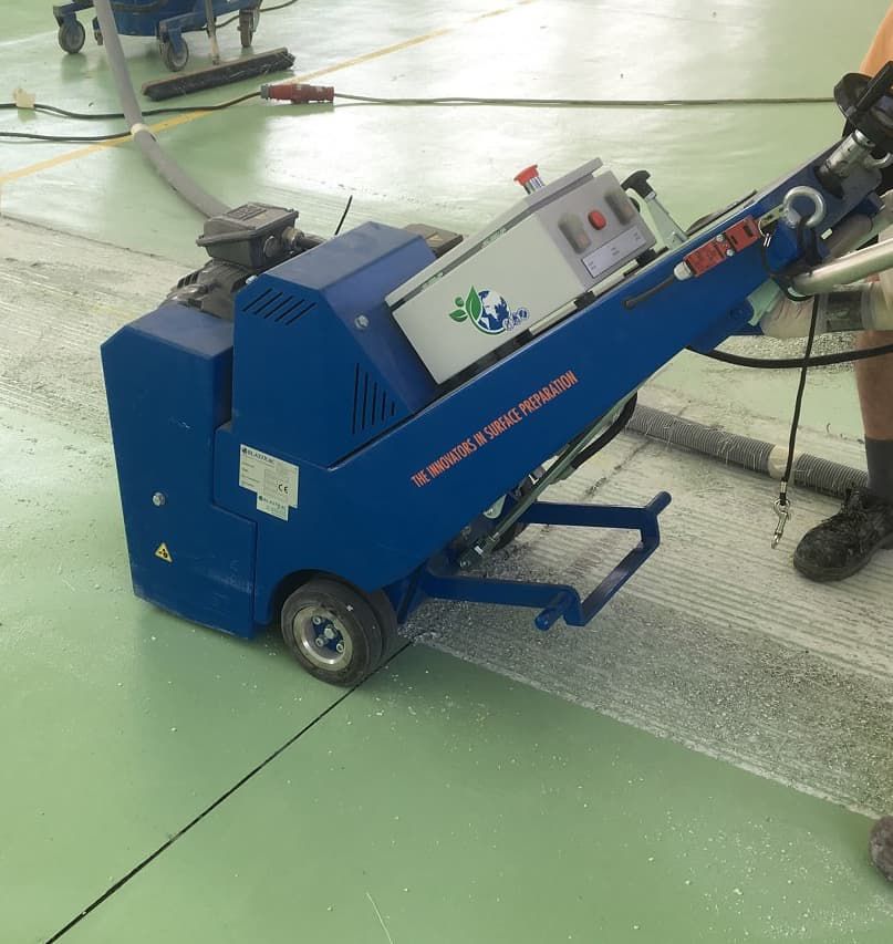 Shot blasting a floor