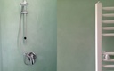 Green Microbond decorative mortar on a shower
