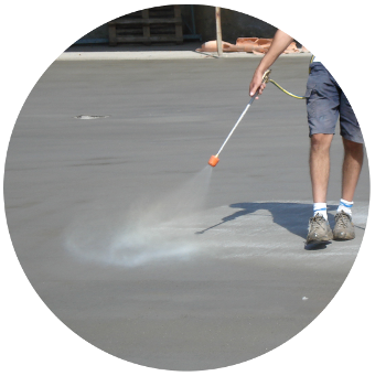 Spray application of Evercrete Pavishield on external concrete flooring