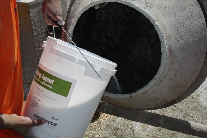 Bonding Agent is added to the concrete mixer mix
