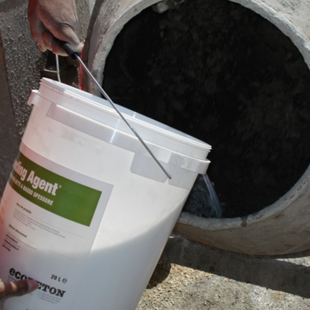 Adding Bonding Agent to the mix in the concrete mixer