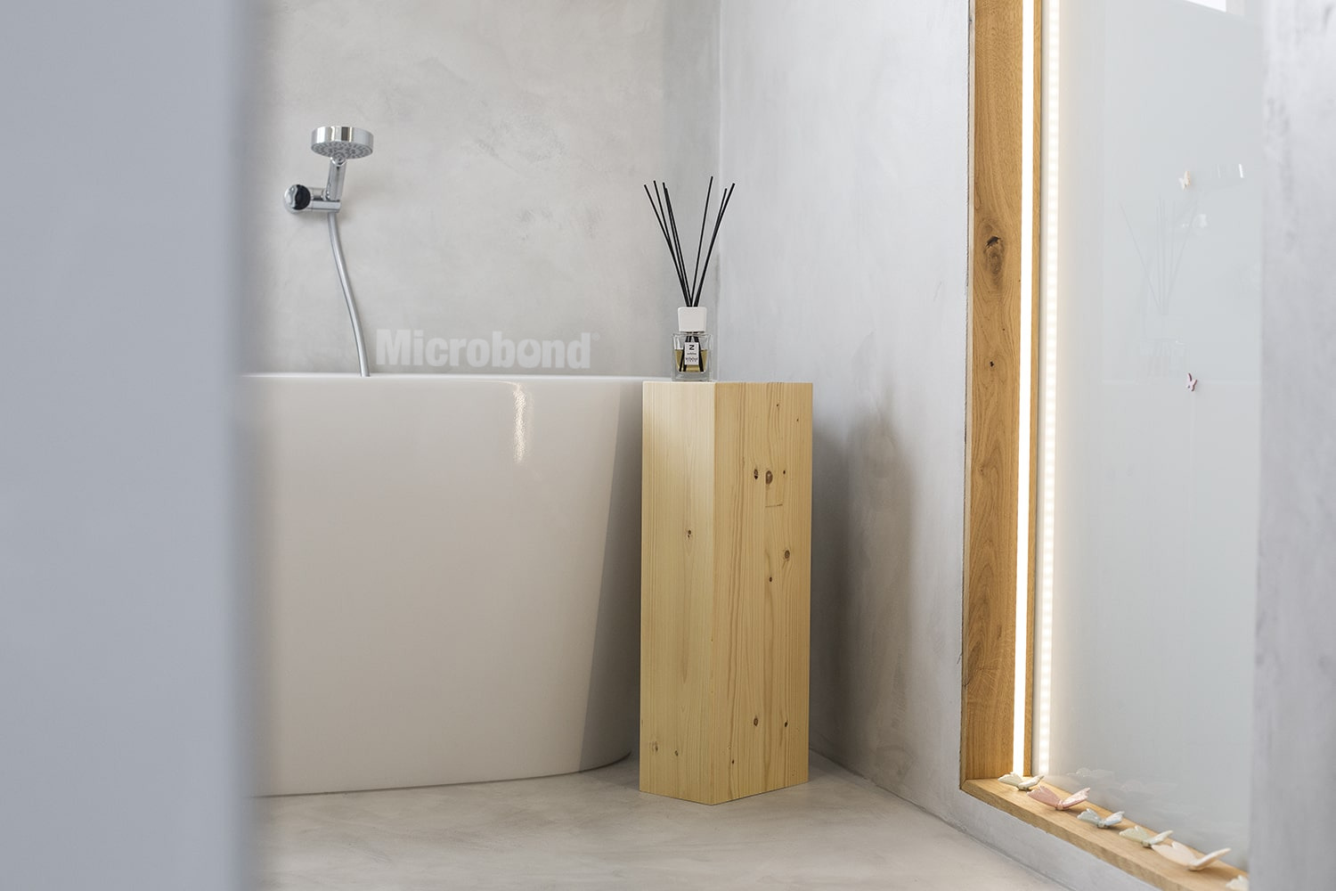 Splendid bathroom covered with Microbond microcement with a delicate textured effect
